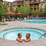 Stoneridge Mountain Resort Canmore - hot tub with couple