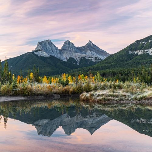 Canmore's Three Sisters Peaks with Lake Mirror